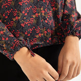 PRINTED TOP WITH HEM DETAIL
