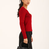 KNIT TOP WITH BROOCH DETAIL