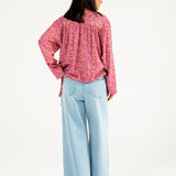 PRINTED TOP WITH HEM DETAIL TOP