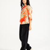 PRINTED TOP WITH HEM DETAIL