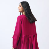 PEPLUM TOP WITH SLEEVE DETAIL