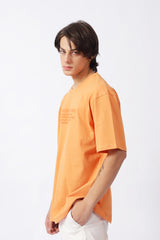 BAGGY FIT EMBOSSED GRAPHIC TEE