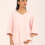 OVERSIZED TEE WITH TIE DETAIL